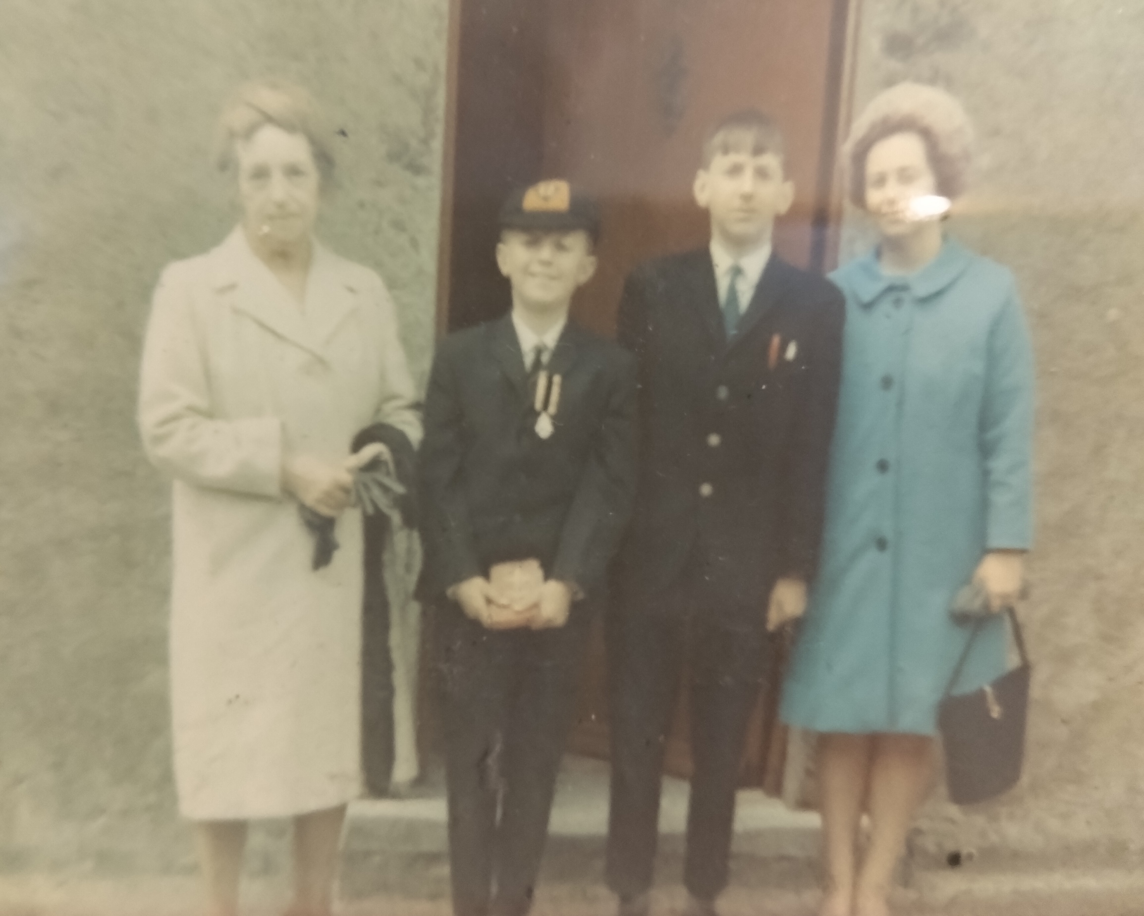 A photograph of a family grandmother, Anne Barry, her daughter and grandsons