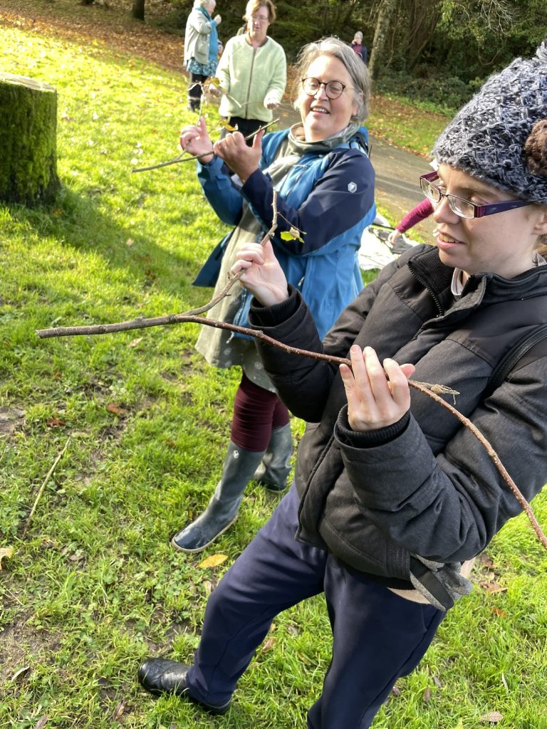 people holding hazel twigs for divining