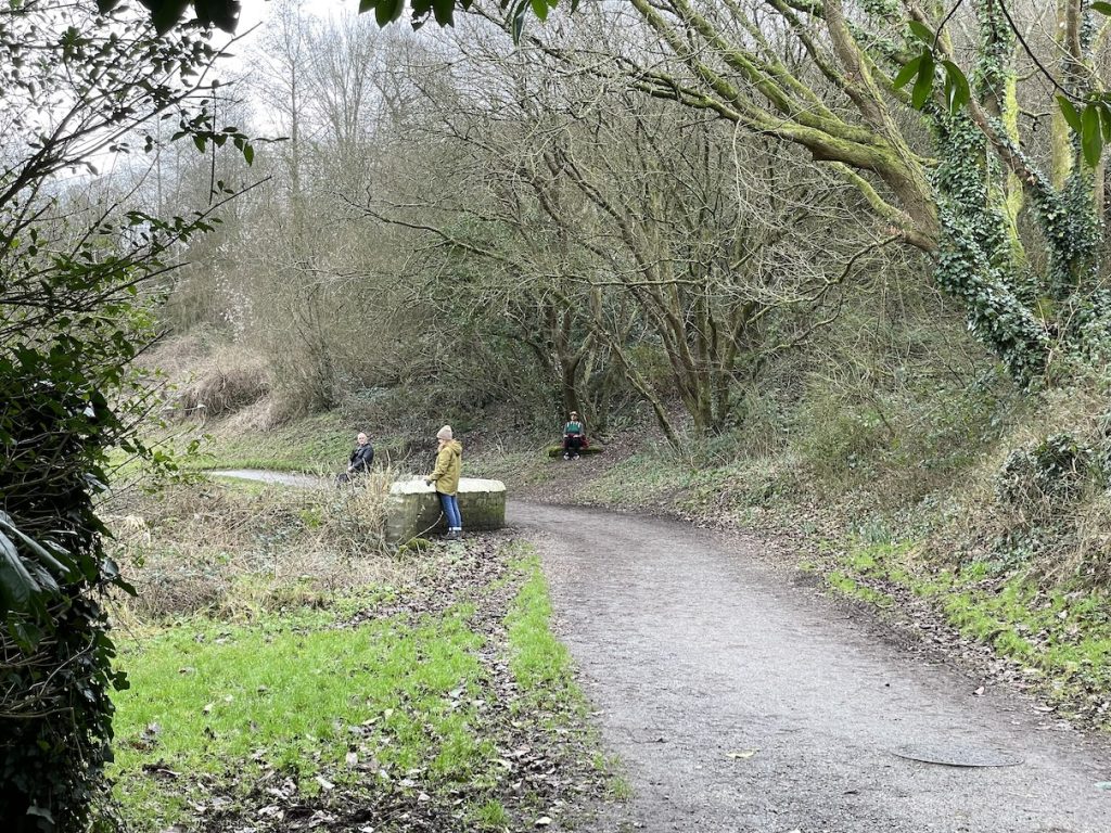 a photo of people listening to the rush and flow of the Glen waters