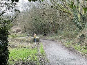 a photo of people listening to the rush and flow of the Glen waters