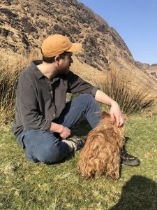 A man and a dog in the landscape